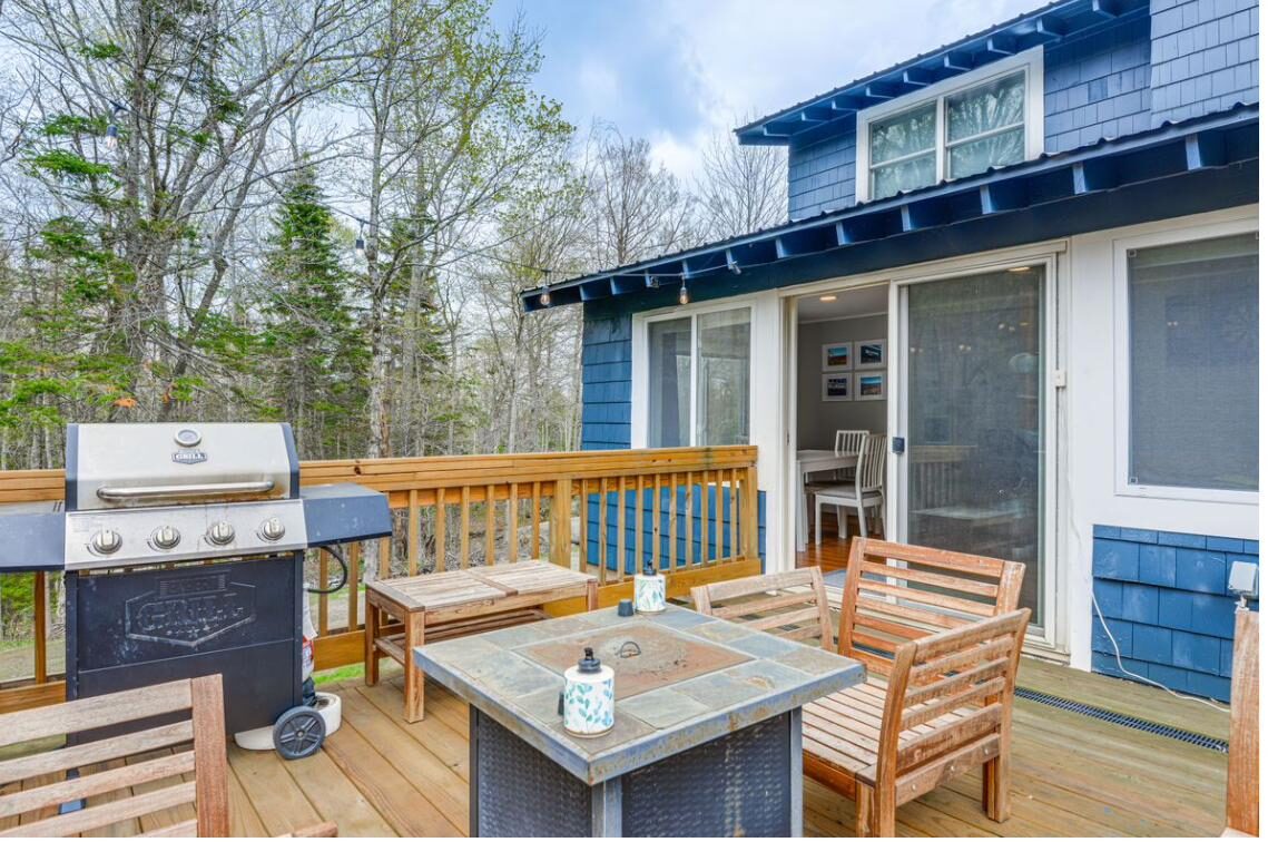 Grill and dining table on the deck