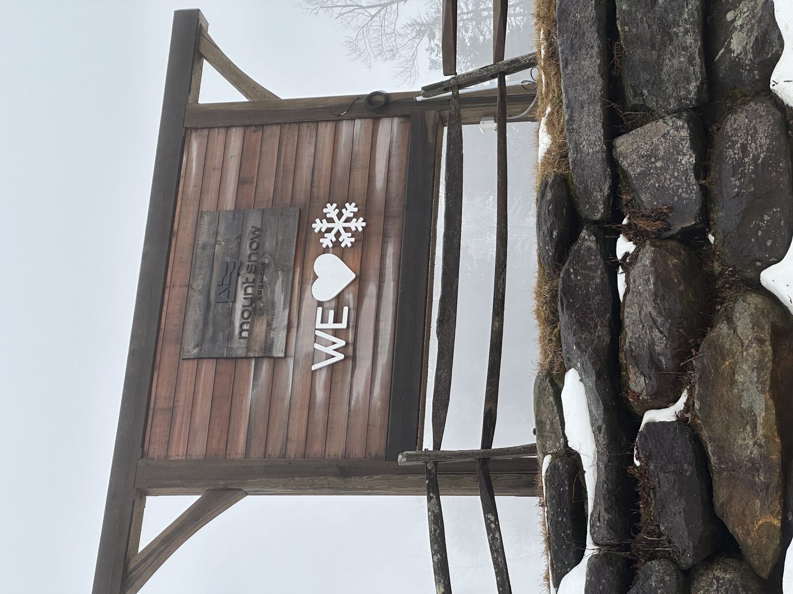 Mount Snow sign reading We Love Snow with a heart and snowflake