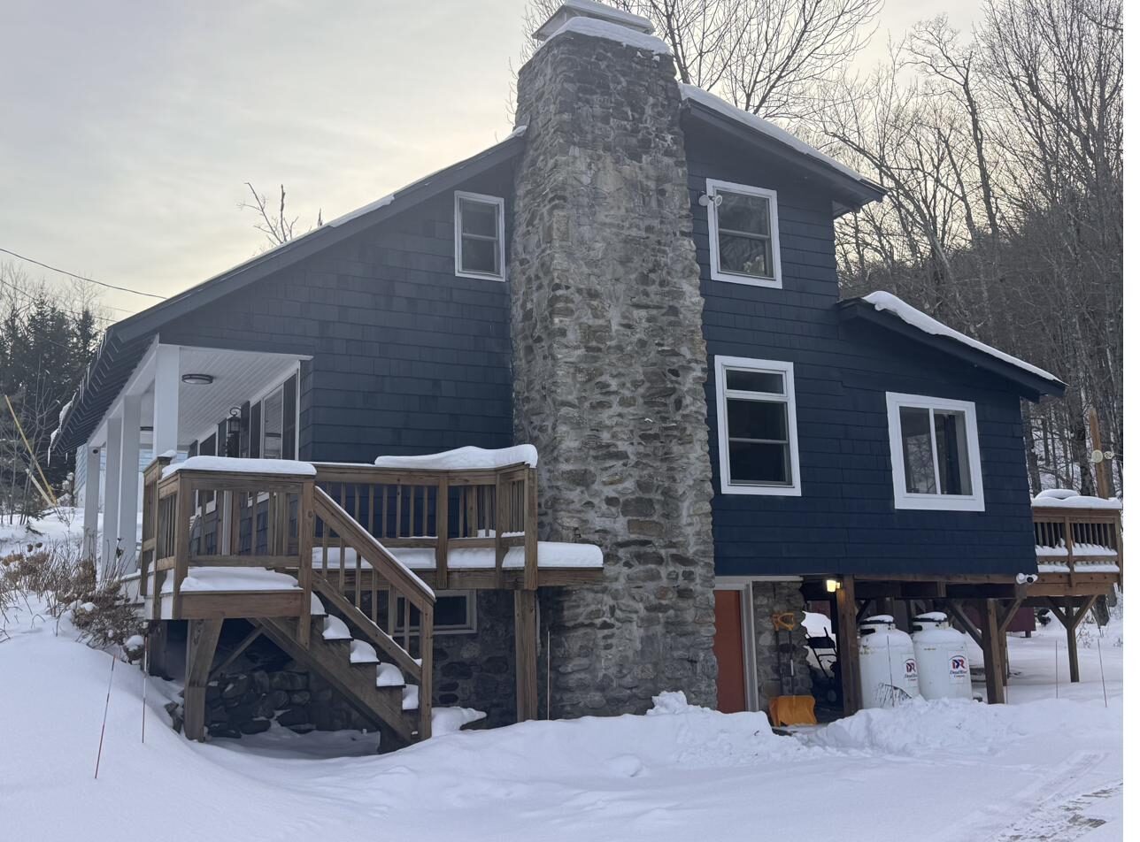 Stone chimney in the snow